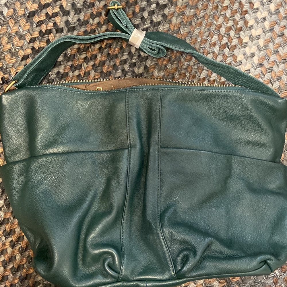 Beautiful green leather like shoulder bag.  New never used